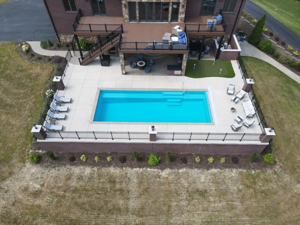 Image of custom fiberglass pool installation by pool companies Borden IN