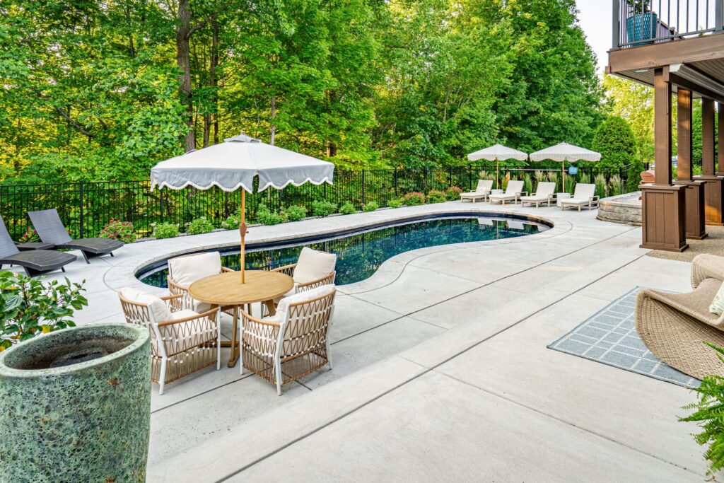 Image of swimming pool contractors Borden IN completing a fiberglass pool installation